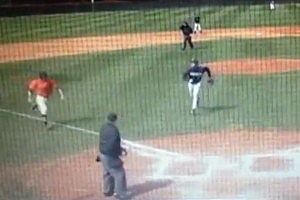 College Baseball Pitcher Tackles Runner College Baseball Pitcher Tackles Runner