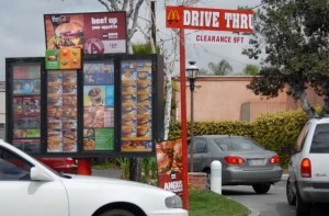 Car queue at the McDonalds drive-through Car queue at the McDonalds drive-through