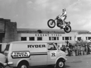 23rd May 1975: American stuntman Evel Knievel practicing jumping over three vans in the car park of Wembley Stadium. 23rd May 1975: American stuntman Evel Knievel practicing jumping over three vans in the car park of Wembley Stadium.